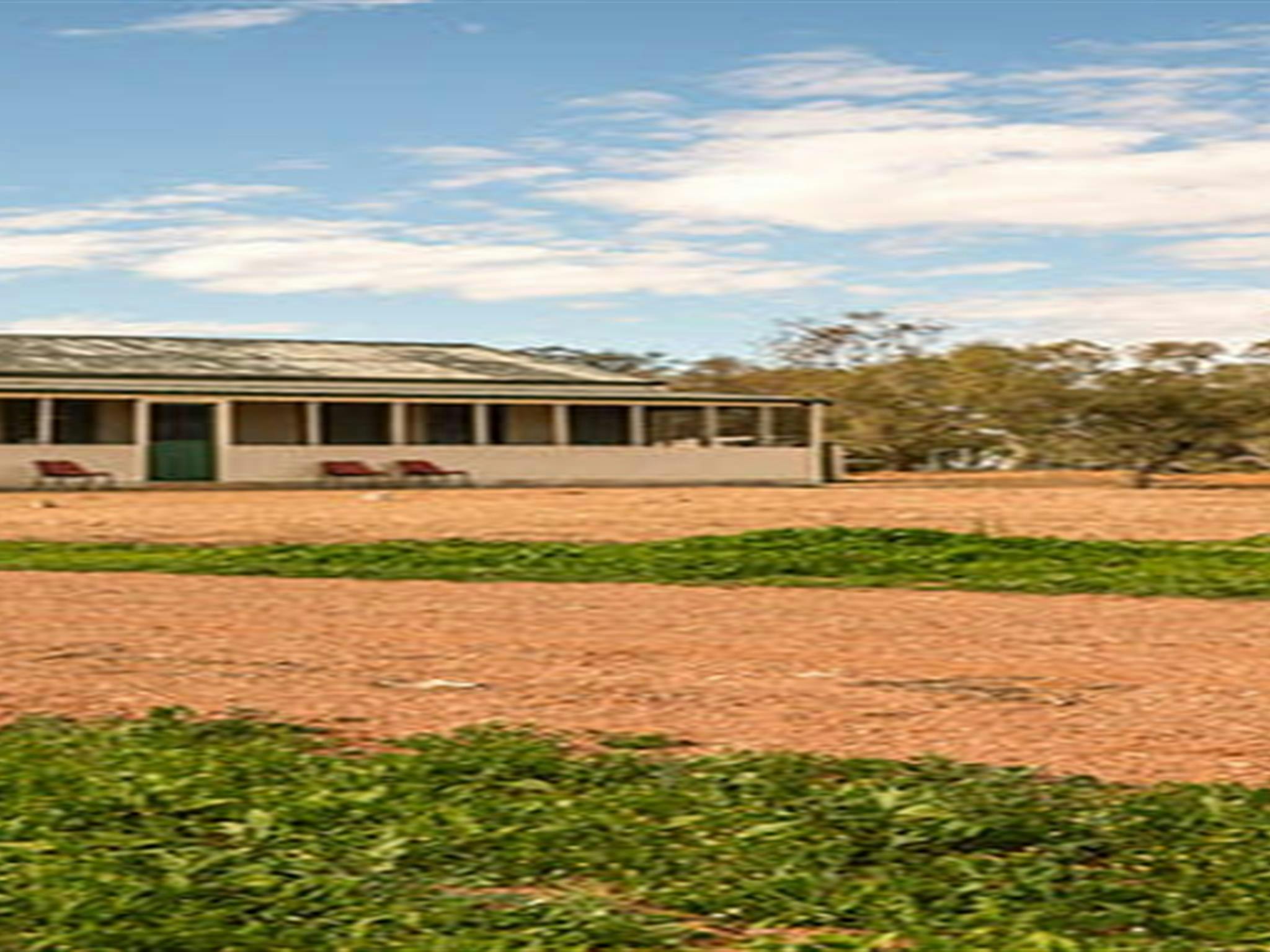 Group of friends walking outside Mount Wood Shearers Quarters. Photo: John Spencer/DPIE